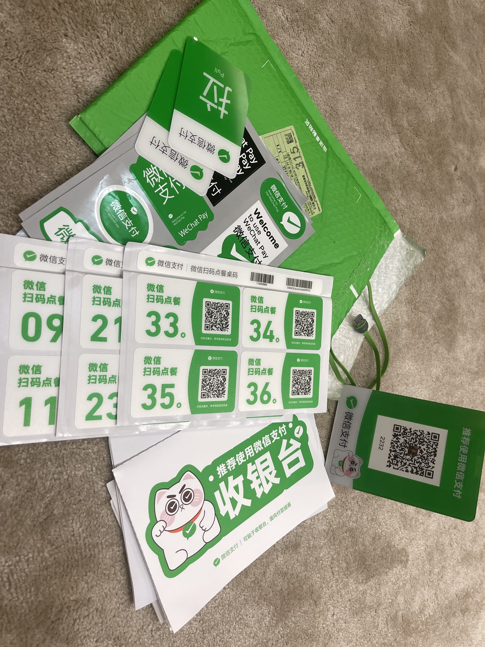The full collateral kit mailed to a merchant